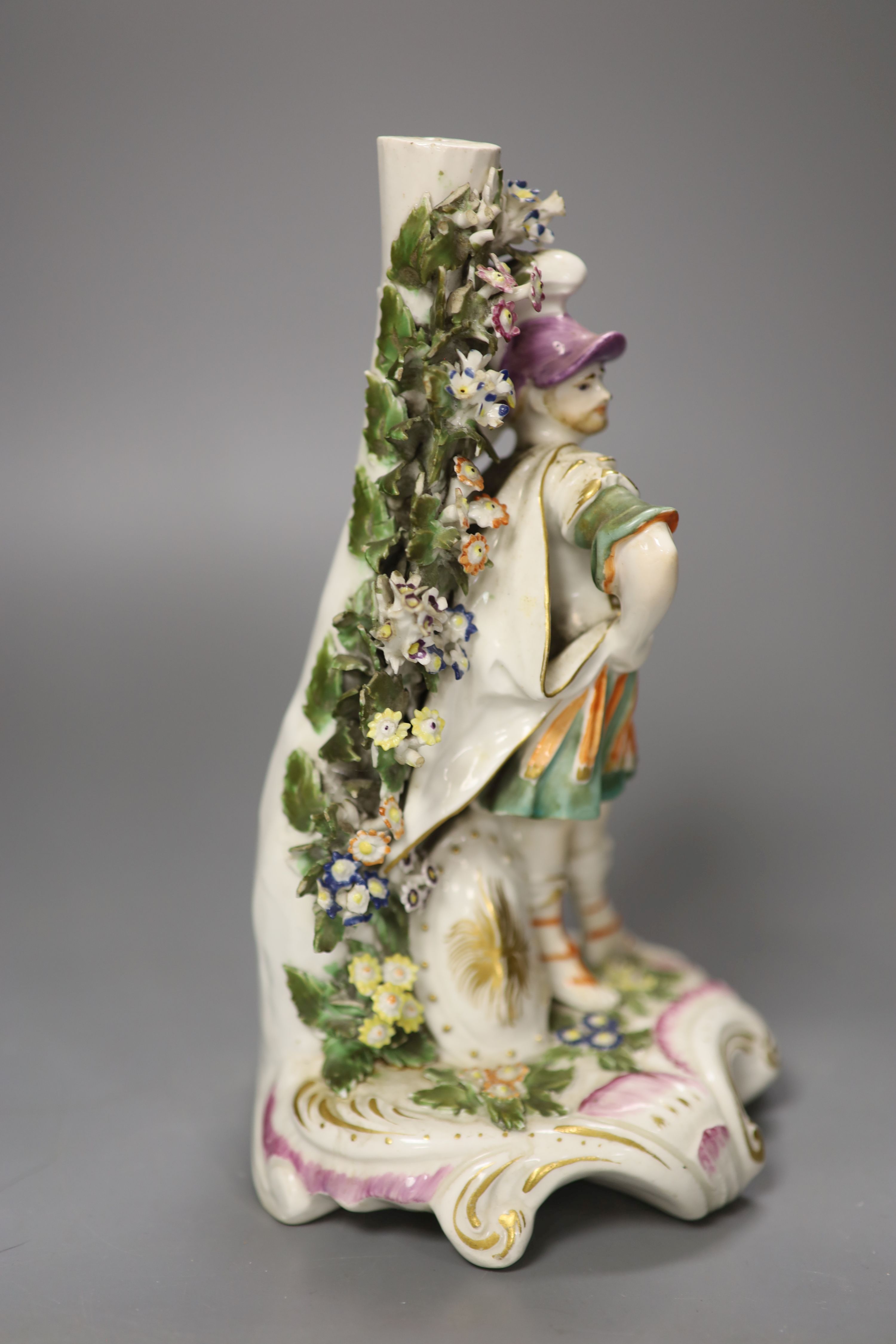 A Derby figure of Mars standing beside a shield in front of a flowering tree c. 1765-70, height 22cm